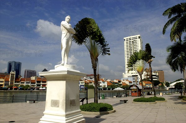 SINGAPORE, General, Riverside white stone statue with city architecture beyond