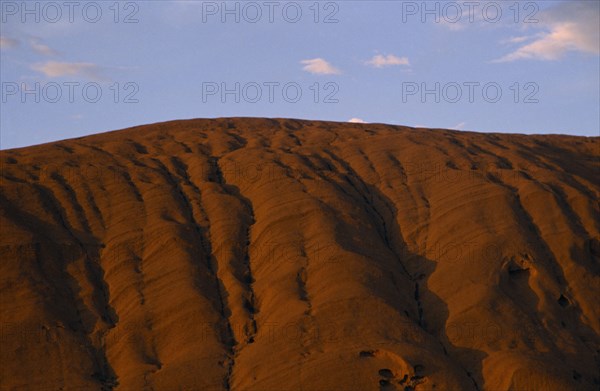 AUSTRALIA, Northern Territory, Uluru, Ayers Rock.  Surface detail at sunset.