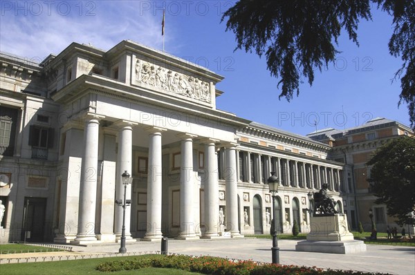 SPAIN, Madrid, Prado Museum columned entrance with statue outside