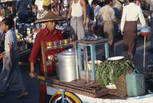 MYANMAR, Yangon, Mobile herbal tea stall.