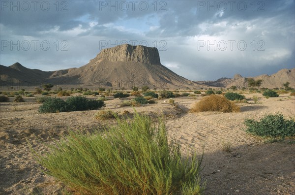 ALGERIA, Hoggar Mountains, Semi desert landscape with rock formations near Tamanrasset.