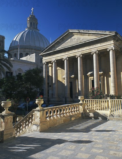 MALTA, Valletta, St Pauls Anglian Cathedral with Dome of carmelite Church behind.
