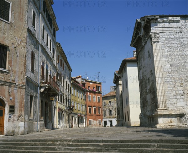 CROATIA, Istria, Pula, Street on the site which was once the Roman Forum at the back of the Temple of Romae and Augustus