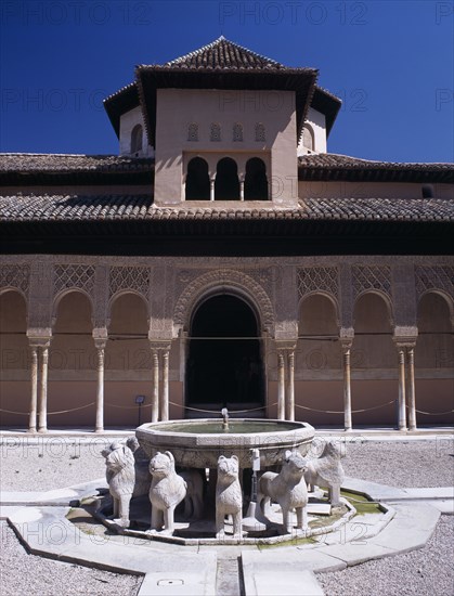 SPAIN, Andalucia, Granada, Alhambra Palace. Palacio Nazaries or Nasrid Palace. Patio de los Leones fountain with carved lions
