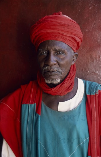 NIGERIA, Kano, Emirs palace guard.  Head and shoulders portrait.