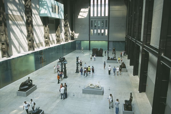 ENGLAND, London, Tate Modern. View over the Old Turbine Hall with modern sculpture exhibits