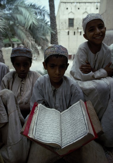 OMAN, North, Rostaq, Boys at Koranic school