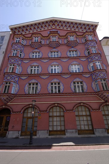 SLOVENIA, Ljubljana, Angled view looking up at the Art Nouveau facade of the Cooperative Bank designed by Ivan Vurnik and decorated by his wife Helena Vurnik in 1922