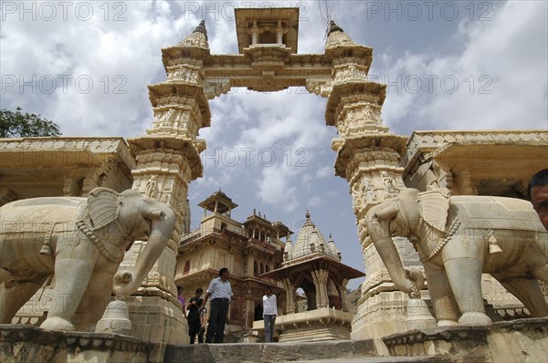 INDIA, Rajasthan, Amber, Shri Jagat Siromaniji Temaple made of whilte marble and ornately with elephant statues either side of the entrance stair