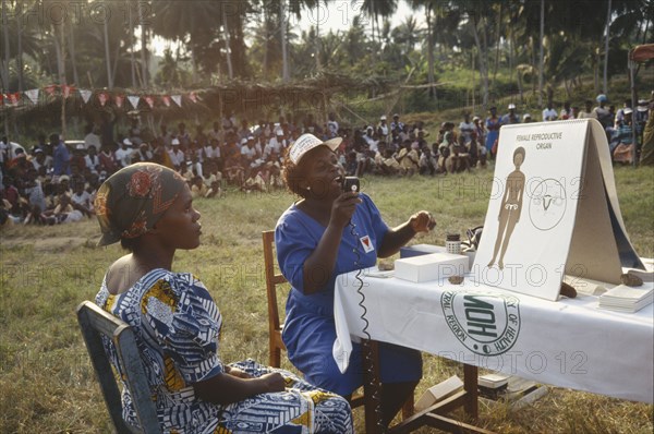 GHANA, Education, Women giving outdoor family planning lecture