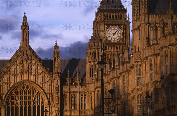 ENGLAND, London, Westminster. Exterior section of the Houses of Parliament and Big Ben seen in evening light