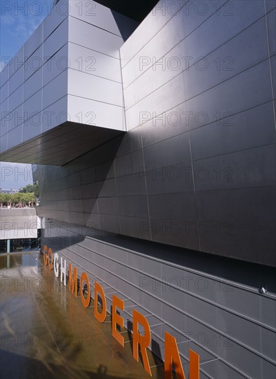 HOLLAND, Noord, Amsterdam, Van Gogh Museum exterior advertising the Gogh Modern Exhibition