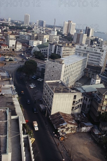 NIGERIA, Lagos, Skyscrapers rising above shanty town