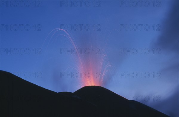GUATEMALA, South, Volcan Pacaya, Highly active Volcano Pacaya erupting at night.