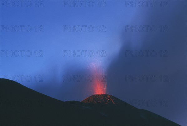 GUATEMALA, South, Volcan Pacaya, Highly active volcano erupting at night.