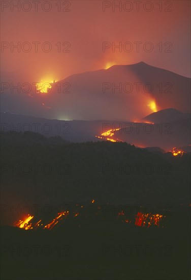 ITALY, Sicily, "Volcano erupting at night, Lava flow from the Monti Calcarazzi fissure."