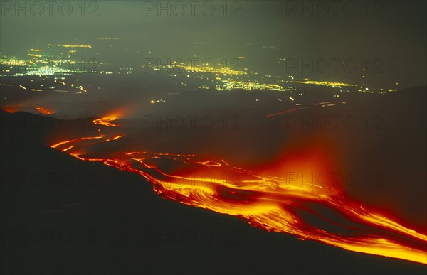 ITALY, Sicily, Night-time view of Volcano erupting. Lava flow from the Monti Calcarazzi fissure.