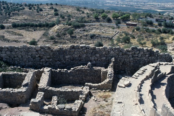 GREECE, Peloponese, Mycenae, Ruins of granary within ancient ruined citadel.