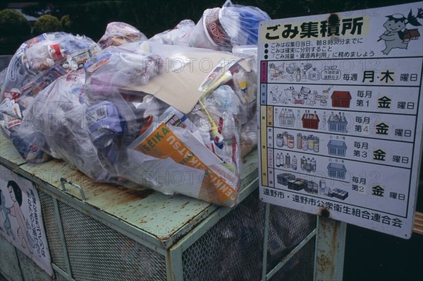 JAPAN, Honshu, Tono, Bagged rubbish dumped at a Recycling point