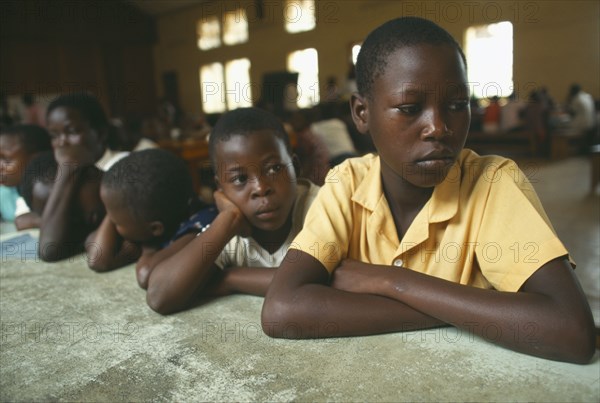 UGANDA, Kampala, Kamwoyke slum area.  Pupils at school for street children