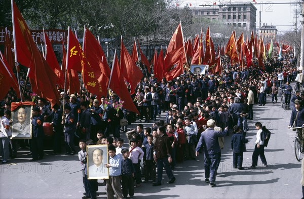 CHINA, Cultural Revolution, Marching crowds waving red banners and posters of Mao during the 1967 Cultural Revolution