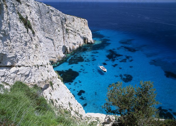 GREECE, Ionian Islands, Zakynthos, New Blue caves near the Skinari headland with tourist boat