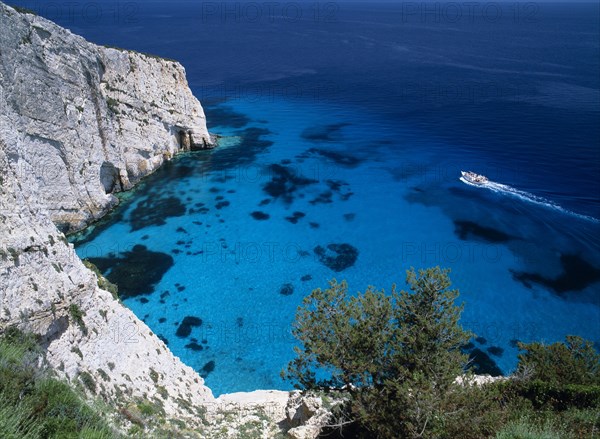 GREECE, Ionian Islands, Zakynthos, New Blue caves near the Skinari headland with tourist boat