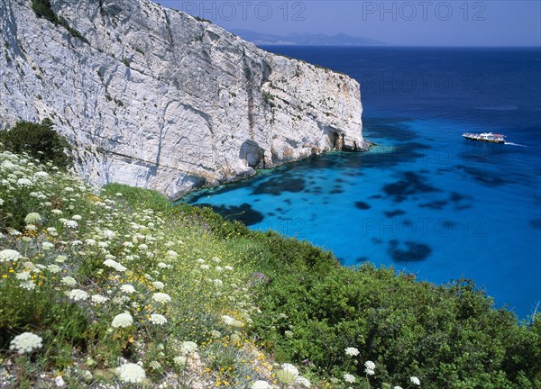 GREECE, Ionian Islands, Zakynthos, New Blue caves near the Skinari headland with tourist boat