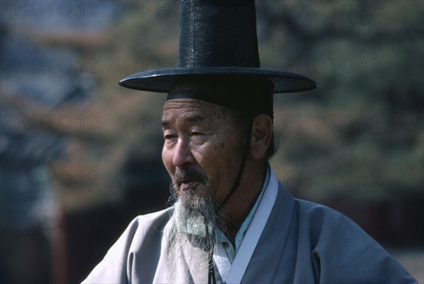 SOUTH KOREA, Seoul, "Elderly male follower of Confucius wearing traditional dress at ceremony, portrait."