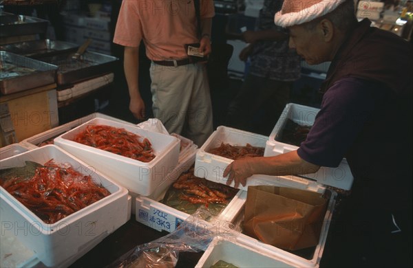JAPAN, Honshu, Tokyo, Tsukiji Fish Market with crates of prawns