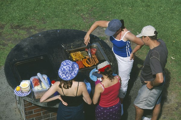 AUSTRALIA, New South Wales, Sydney, Barbecue at Tamarama beach south of Bondi in the Eastern Suburbs.