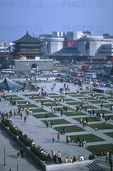 CHINA, Shaanxi, Xian. View from Drum Tower across busy square towards Bell Tower.