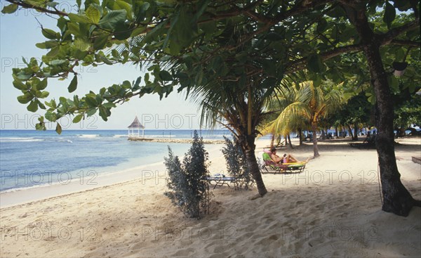 JAMAICA, Montego Bay, Beach and trees at the Half Moon Hotel