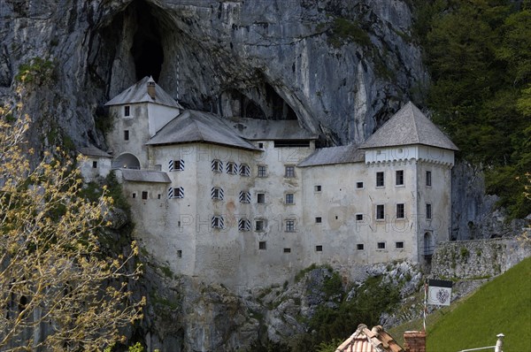 SLOVENIA, Predjama Castle, 16th Century castle built half way up 123M high cliff