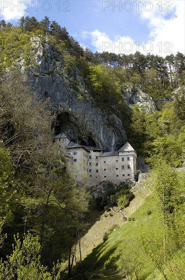 SLOVENIA, Predjama Castle, 16th Century castle built half way up 123M high cliff