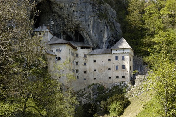 SLOVENIA, Predjama Castle, 16th Century castle built half way up 123M high cliff