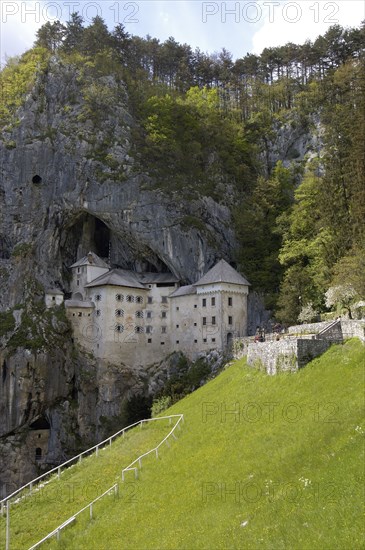 SLOVENIA, Predjama Castle, 16th Century castle built half way up 123M high cliff