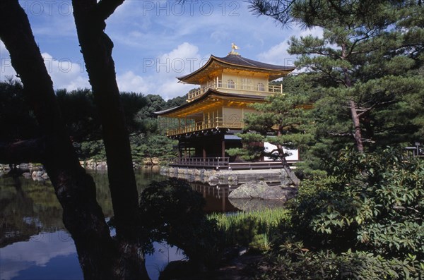 JAPAN, Honshu, Kyoto, Kinkaku Ji Temple aka the Golden Pavilion seen through trees