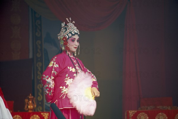 CHINA, Shanxi Province, Wutaishan, Performer on stage in Chinese Opera.