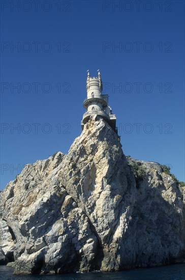 UKRAINE, Crimea, Swallow’s Nest, Cliff top folly built by German oil magnate in the 1900s.