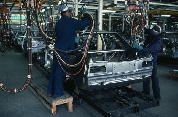 WEST INDIES, Trinidad, Arima, Neal and Massy car assembly plant and workers.