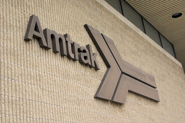 USA, Minnesota, St Paul, Amtrak passenger railroad sign and symbol on outside of Amtrak Train Station.