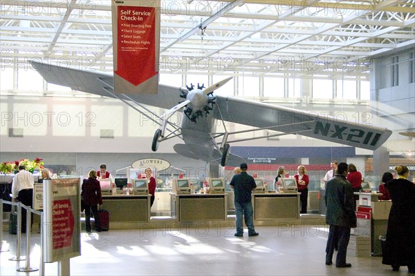 USA, Minnesota, Minneapolis, View of the overhead Spirit of St Louis Airplane at the Minneapolis-St. Paul International Airport Charles Lindbergh Terminal.
