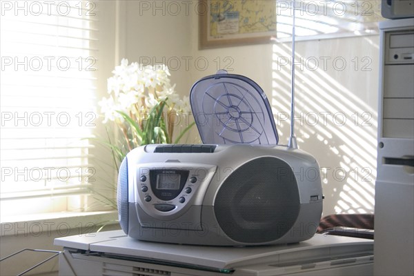 USA, Minnesota, St Paul, CD player next to desk in home office.