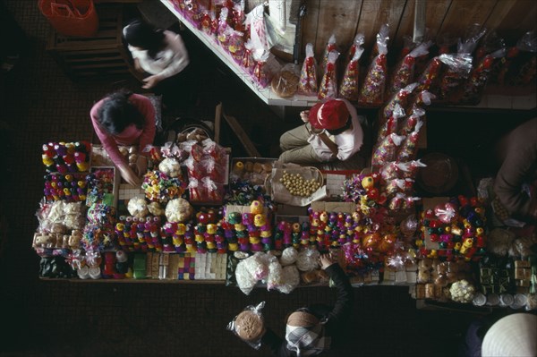 VIETNAM, North, Festivals, Looking down on stall selling firecrackers for Tet or New Year.