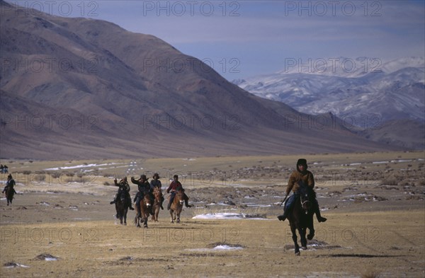 MONGOLIA, Bayan Olgii, Nomads, Kazakh nomads gathering for New Year horse race.