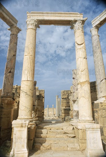 LIBYA, Tripolitania, Leptis Magna, Ruins of Roman city founded in 6th Century BC.  Carved columns and masonry in the theatre.