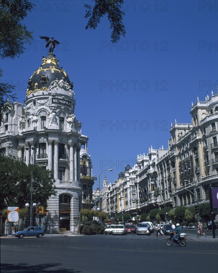 SPAIN, Madrid State, Madrid, Alcala Grand Via Junction. View over road and traffic towards the Metropolis building.