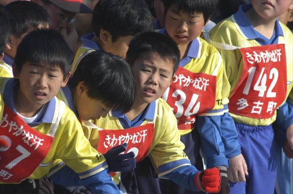 JAPAN, Chiba, Tako, "10-11 year old boys, who are members of local soccer club, wait the start of 2 kilometer race which is part of the towns fitness festival"