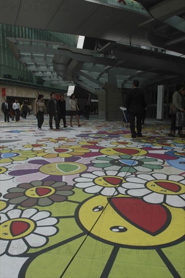 JAPAN, Honshu, Tokyo, Roppongi Ark Hills. Ark Tower shopping area with Takashi Murakami art on the pavement